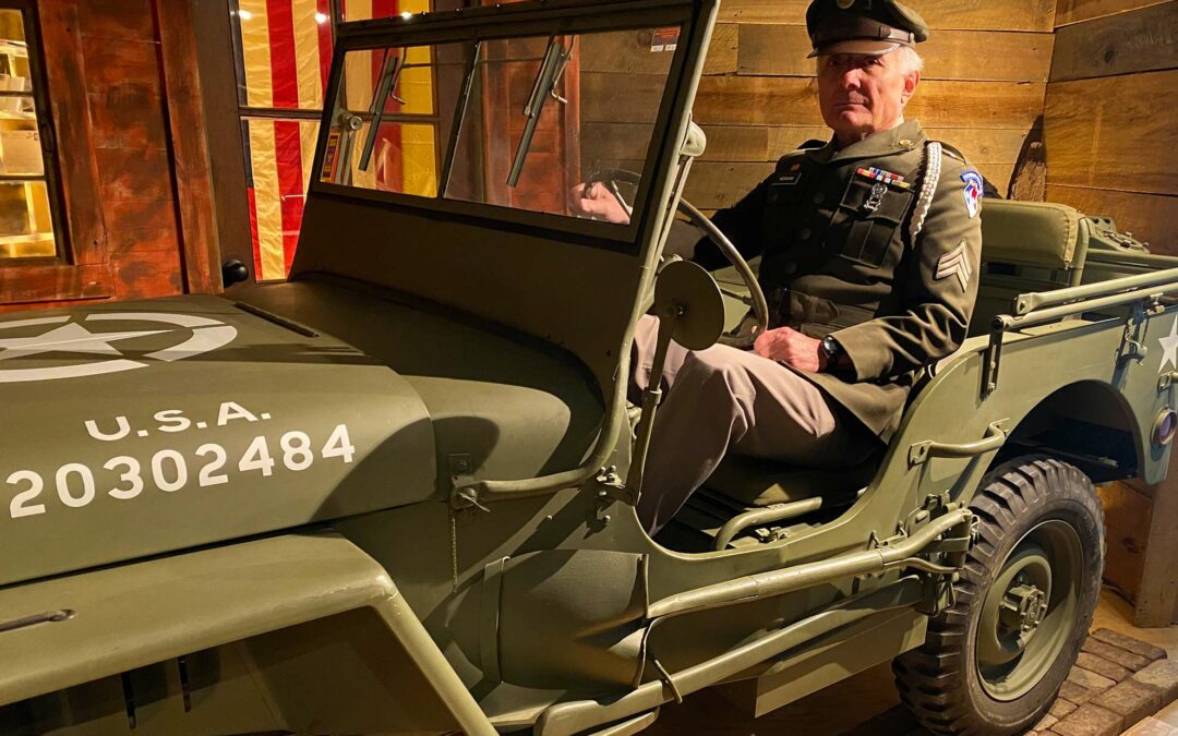 general sitting wwii willy jeep